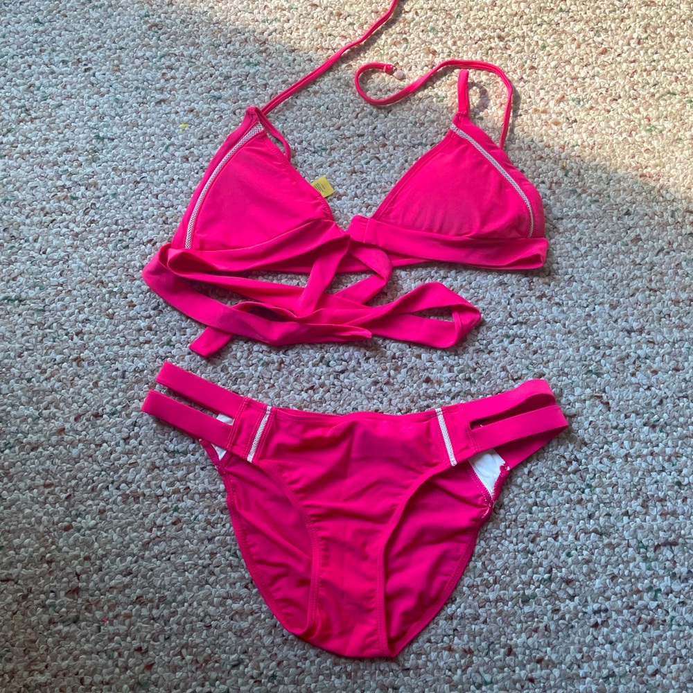 Two piece pink bathing suit in size small.